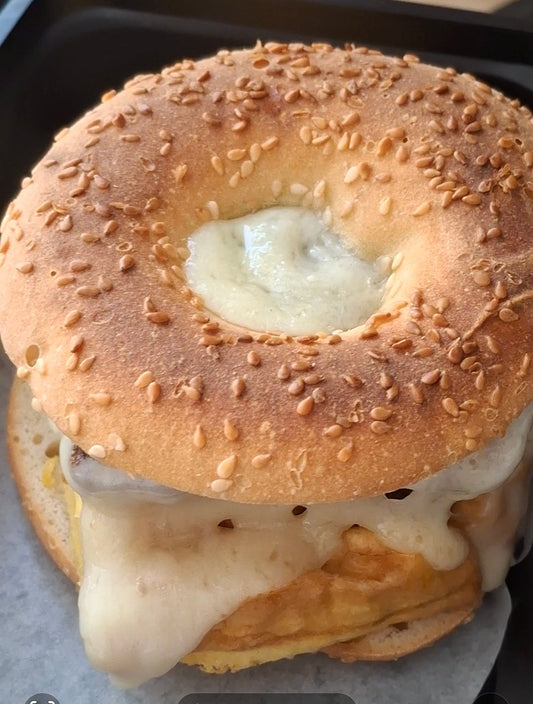 Bagel sandwich with cream cheese on a tray Meal prep Spartanburg SC 